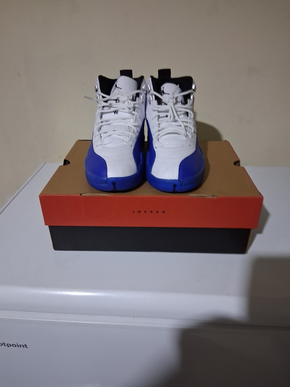 Jordan Men’s White and Blue Retro Basketball Sneakers